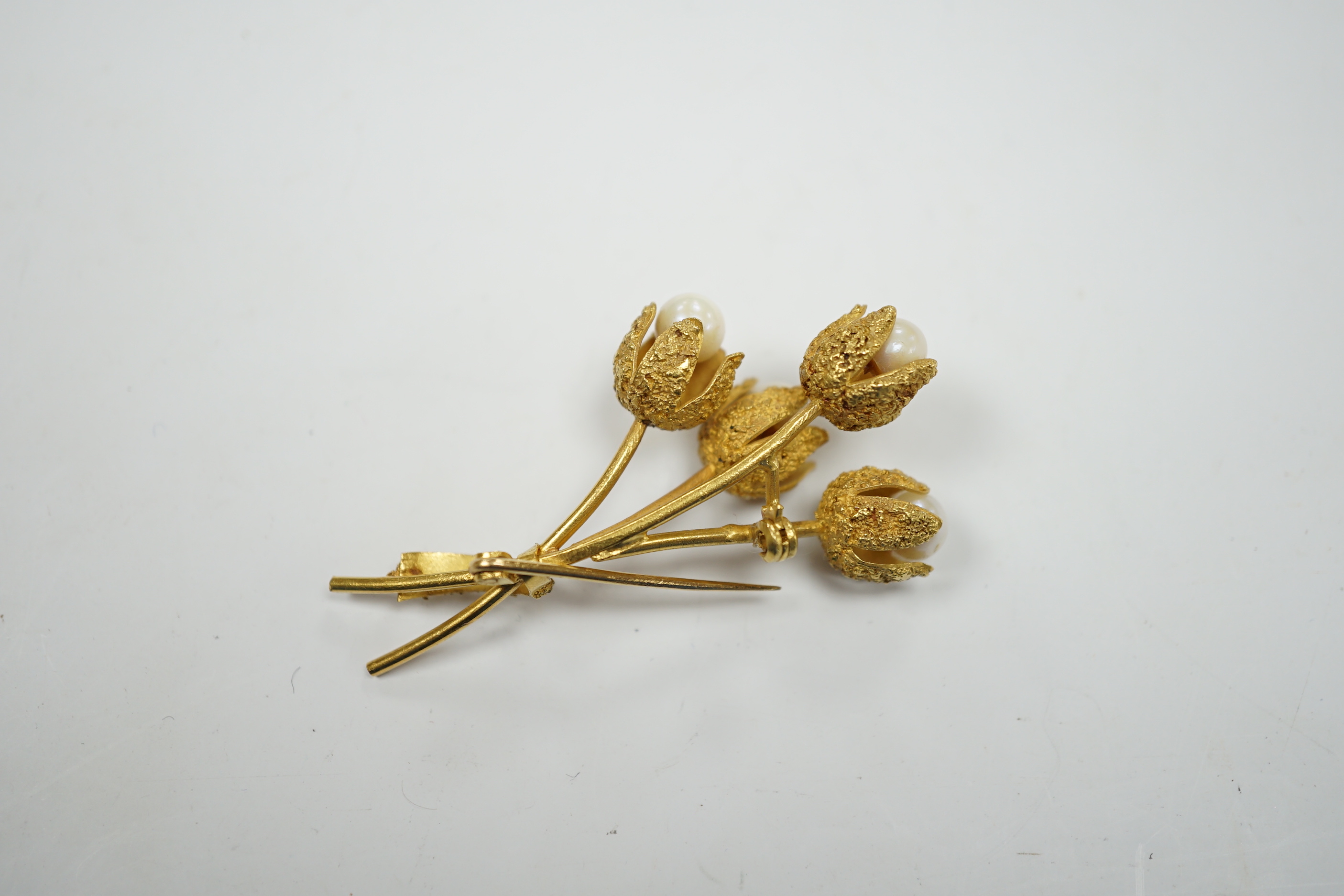 A continental 18k yellow metal and four stone cultured pearl set spray brooch, 54mm, 13.4 grams.